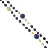 A lapis lazuli and cultured pearl necklace and earring set.Length of necklace 100cms.