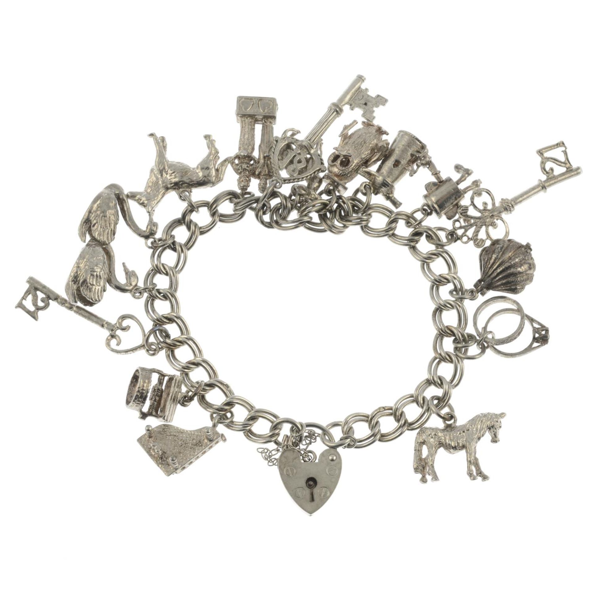 Two silver charm bracelets,