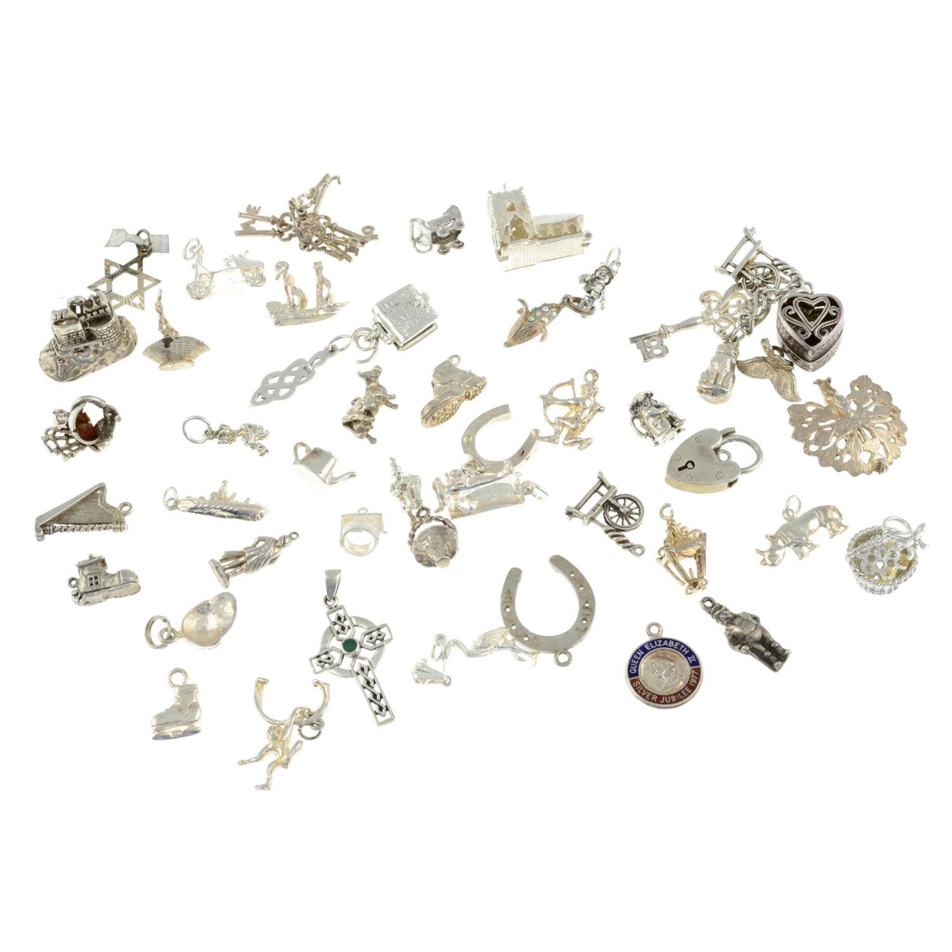 A selection of charms, to include a charm of a Sussex spaniel, a snake and a box terrier. - Image 2 of 2