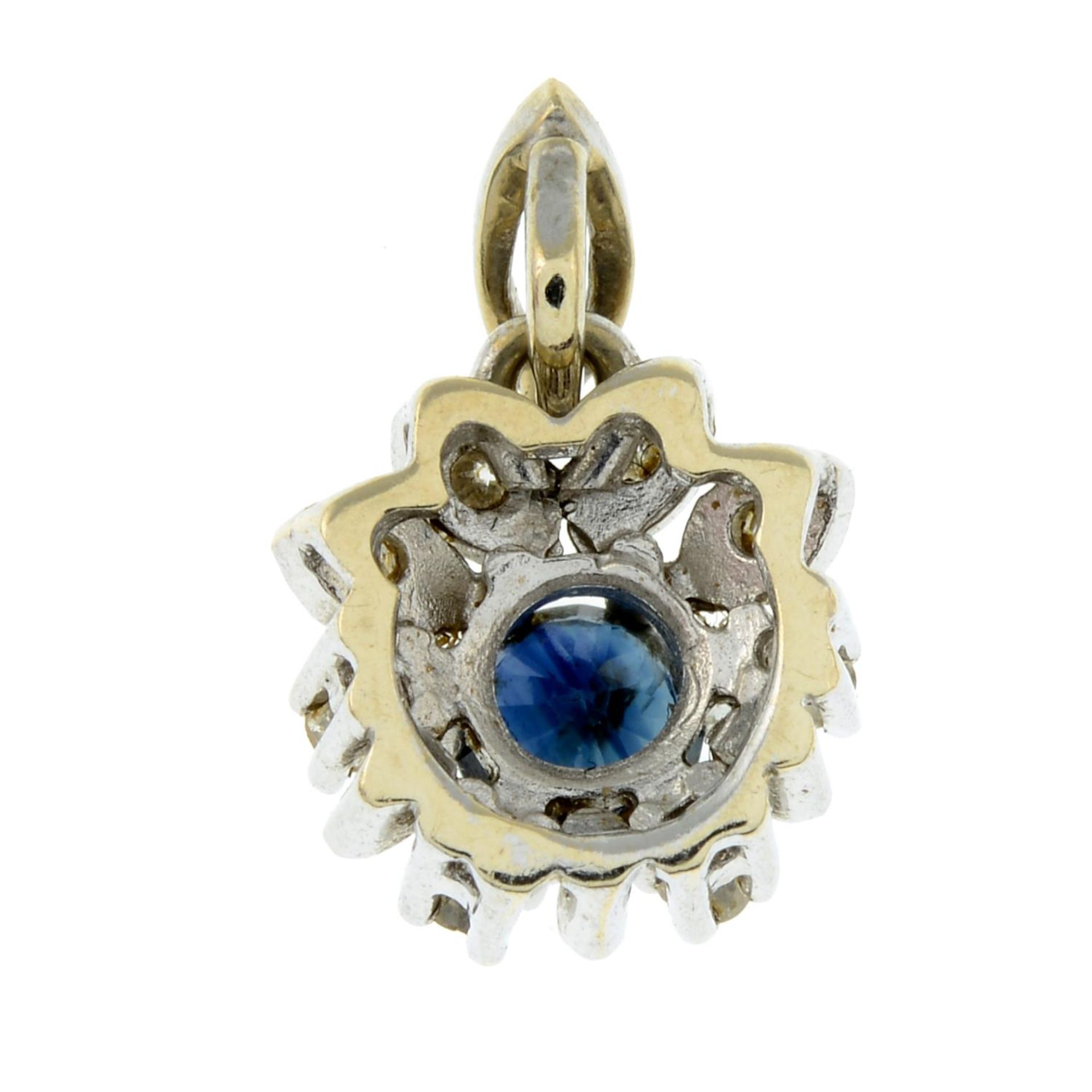 A sapphire and diamond pendant.Stamped 585.Length 1.7cms. - Image 2 of 2