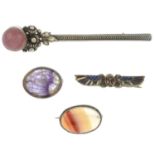 A selection of jewellery to include three gem brooches.