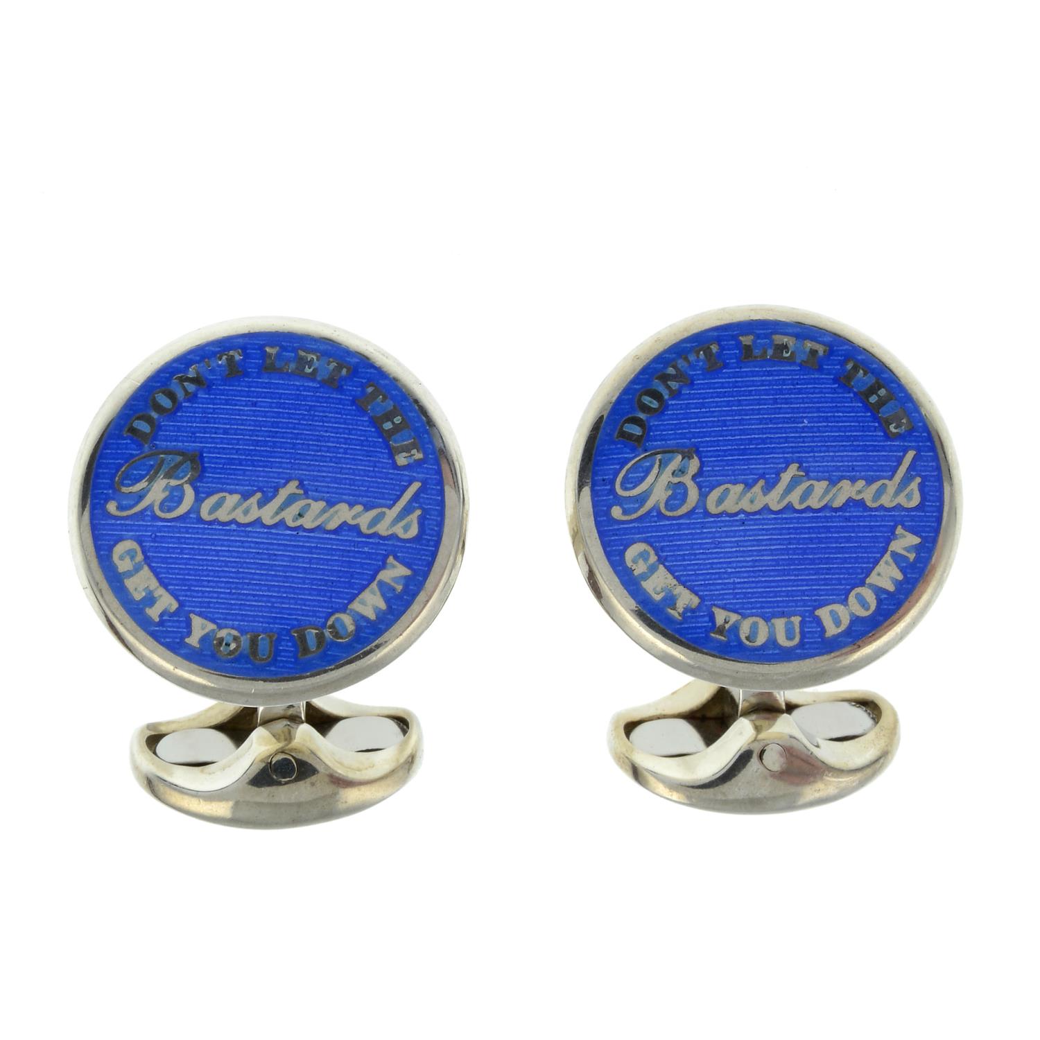 A pair of blue enamel 'Dont let the Bastards get you down' cufflinks,