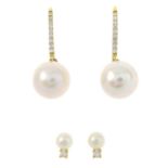 A pair of cultured pearl & diamond drop earrings along with a pair of freshwater pearl & diamond