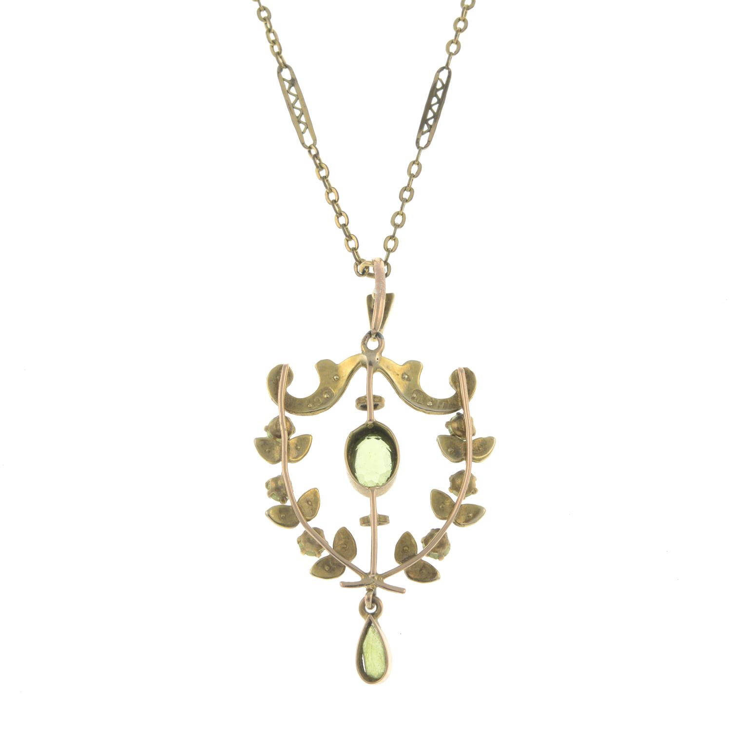 An early 20th century 9ct gold peridot and split pearl openwork pendant, - Image 2 of 2