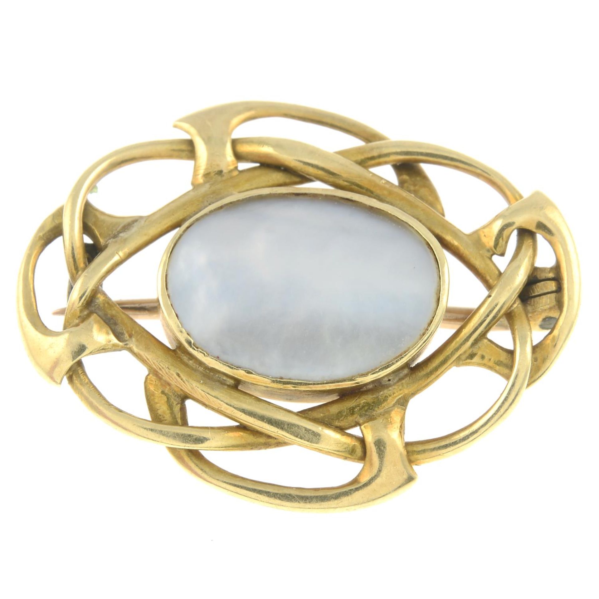 An Edwardian mother-of-pearl brooch.Length 2.4cms.