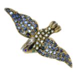 An Austro-Hungarian bird brooch with sapphire and pearl detail.Length 4.5cms.