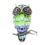 A plique-a-jour enamel owl brooch with ruby and pyrite detail.May also be worn as a pendant.Stamped