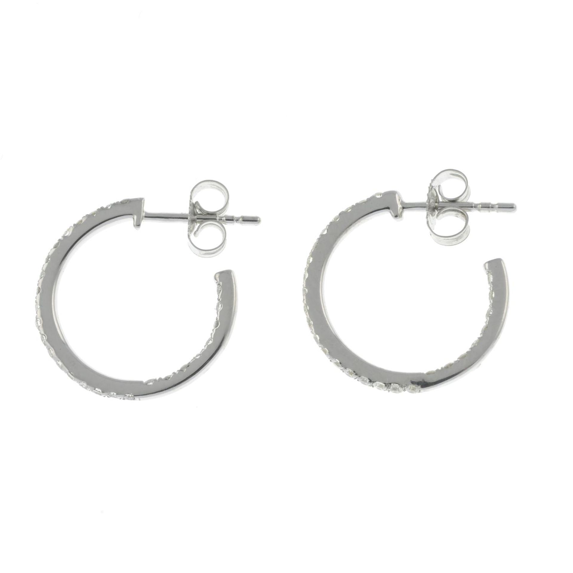 A pair of 9ct gold brilliant-cut diamond hoop earrings. - Image 3 of 3