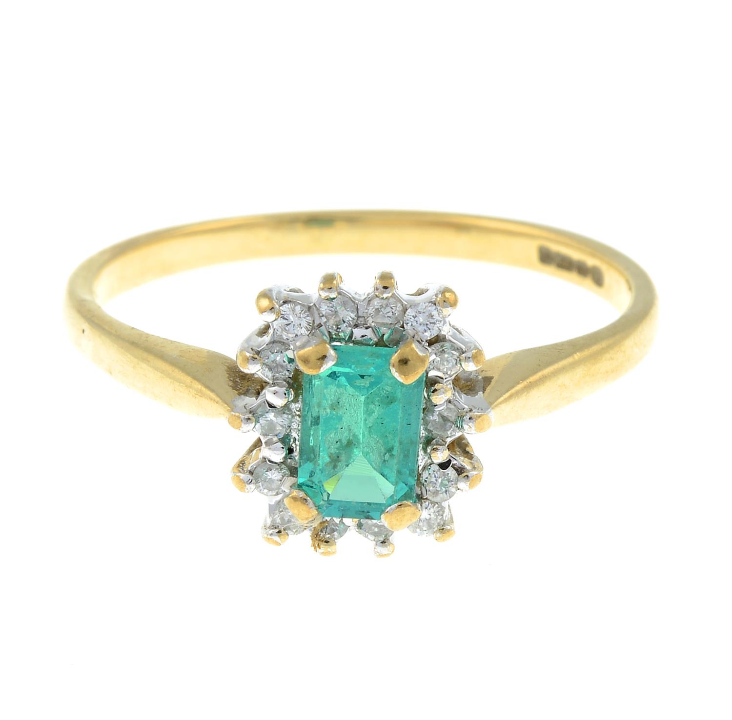 A 9ct gold synthetic emerald and diamond cluster ring.Total diamond weight 0.15ct,