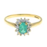 A 9ct gold synthetic emerald and diamond cluster ring.Total diamond weight 0.15ct,