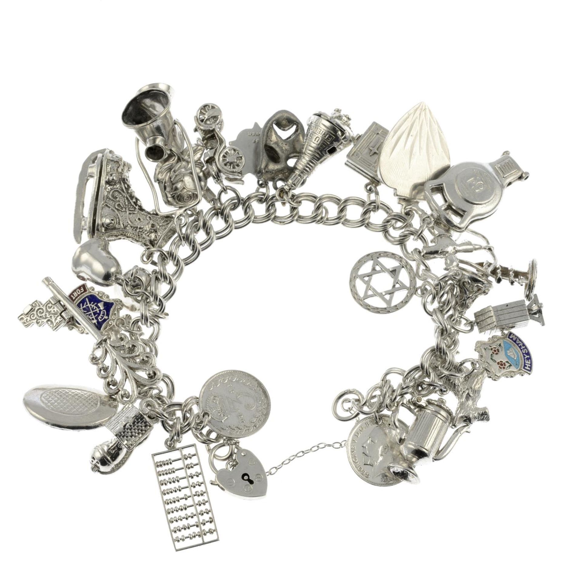 A silver charm bracelet, a further charm bracelet and assorted charms.Hallmarks for Birmingham. - Image 2 of 2