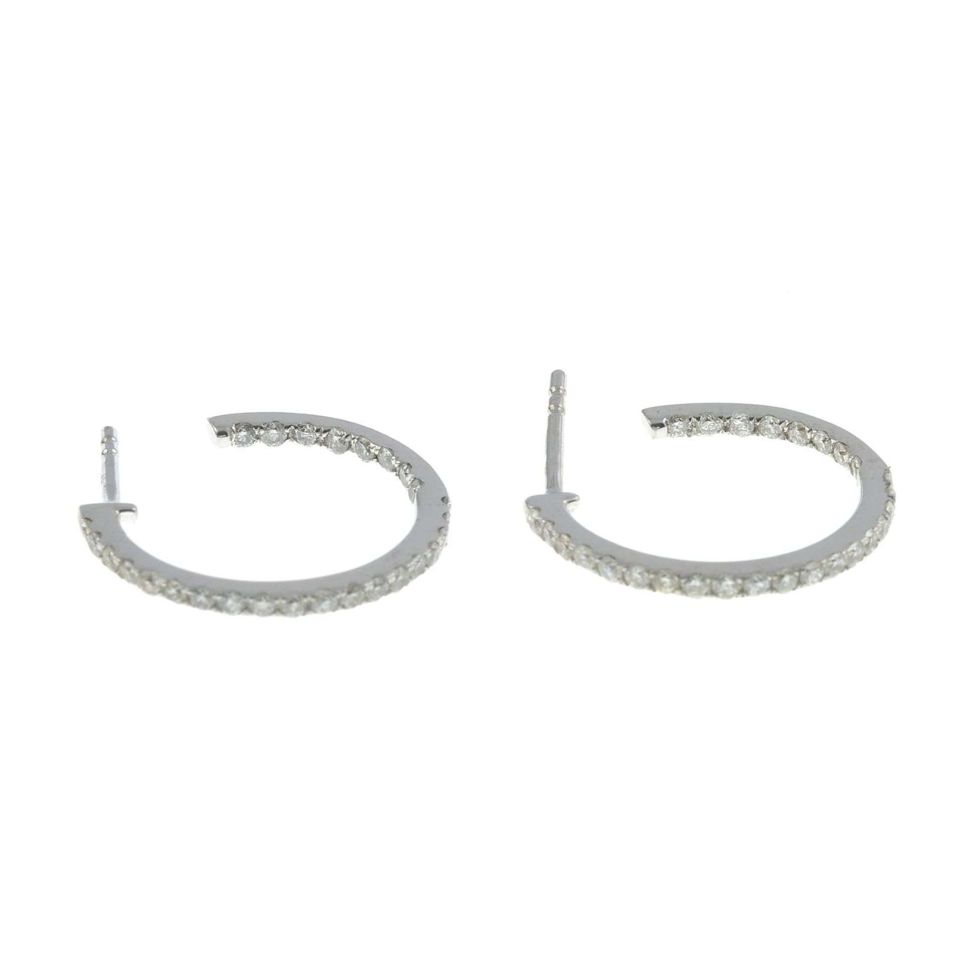 A pair of 9ct gold brilliant-cut diamond hoop earrings. - Image 2 of 3