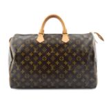 LOUIS VUITTON - a Monogram Speedy 40 handbag.