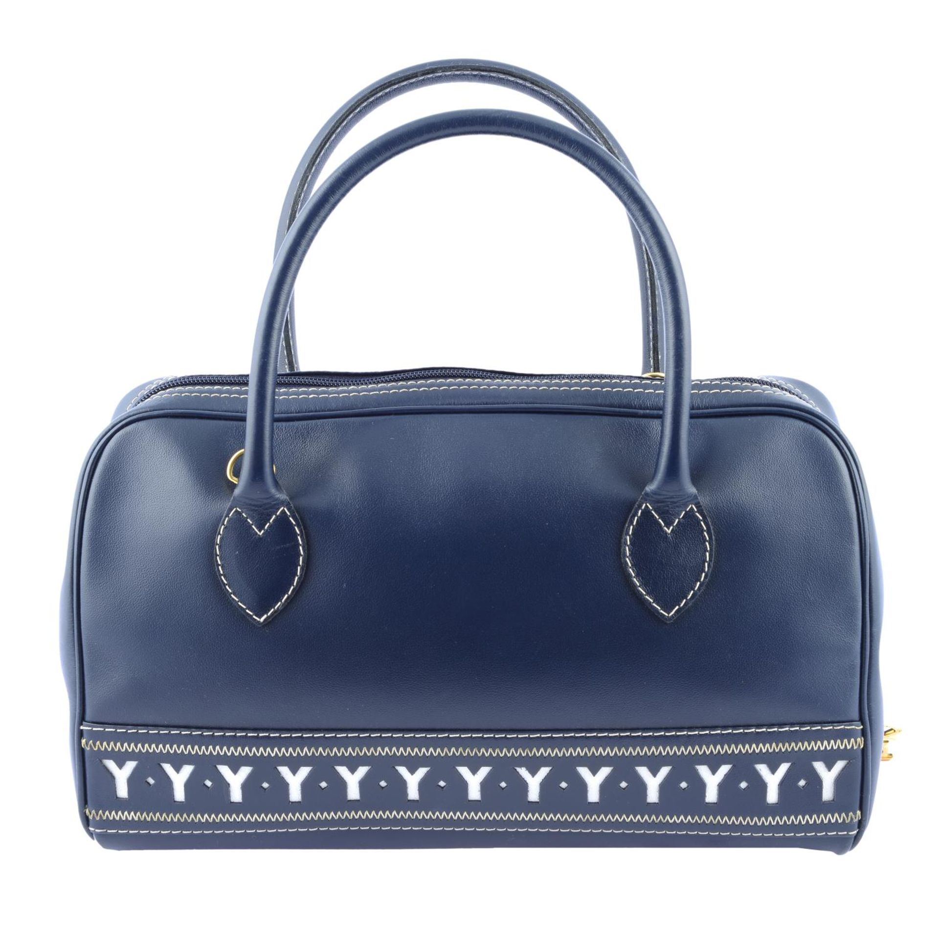 YVES SAINT LAURENT - a navy blue Y Logo Bowling bag.