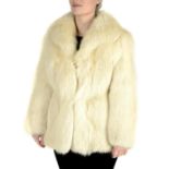 An arctic fox fur coat.