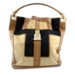 ANYA HINDMARCH - a patchwork pony fur and leather handbag.