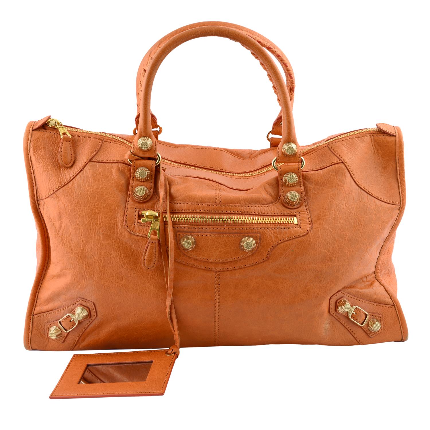 BALENCIAGA - an orange Giant Work handbag.