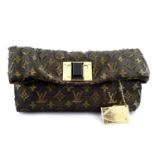 LOUIS VUITTON - a limited edition Lurex Bronze Monogram Jacquard Altair clutch.