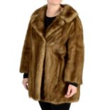 A three-quarter length wild mink jacket.