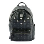 MCM - a black coated canvas Stark Stud GM backpack.