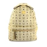 MCM - a light beige coated canvas Stark Side Stud GM Backpack.