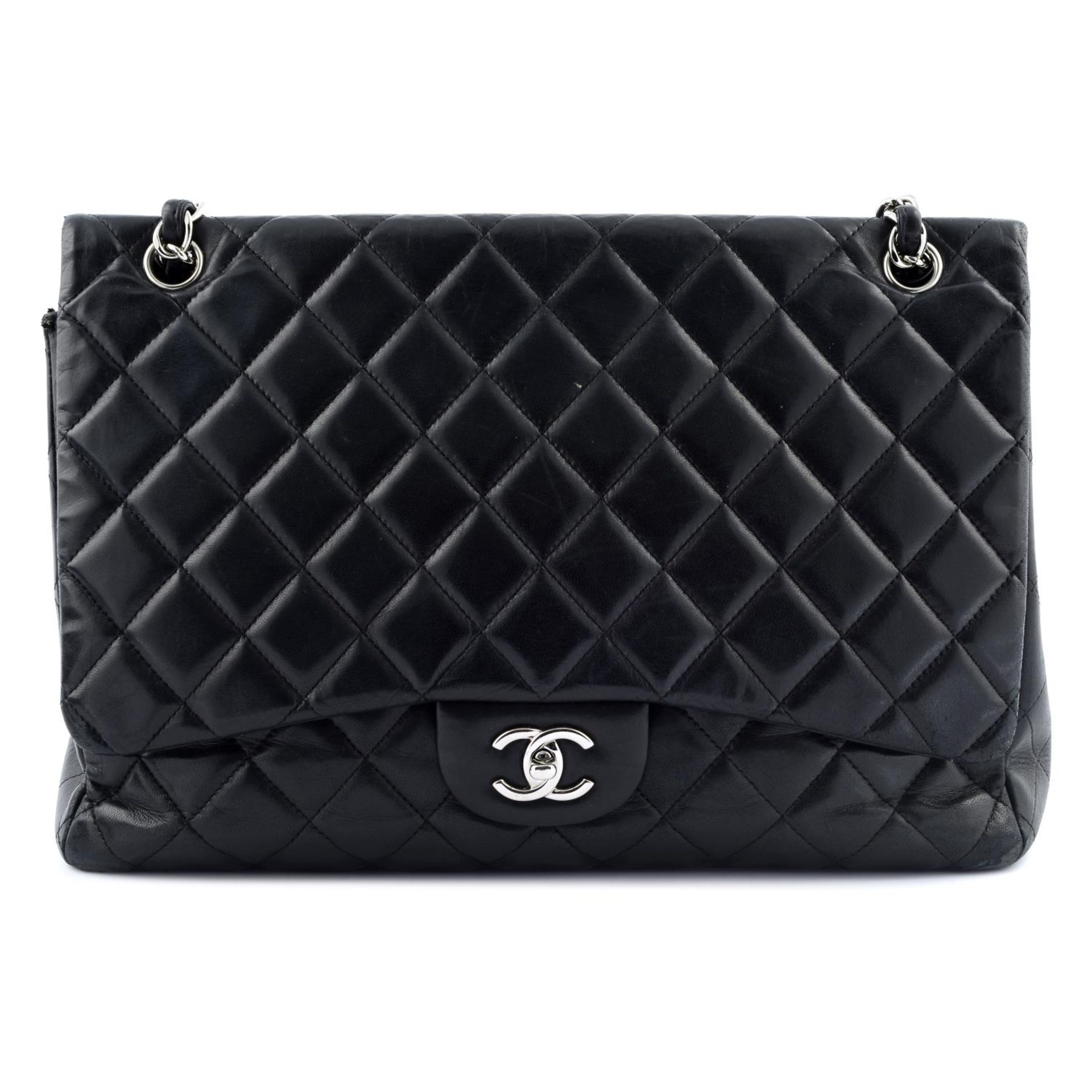 CHANEL - a Maxi Classic Single Flap handbag.