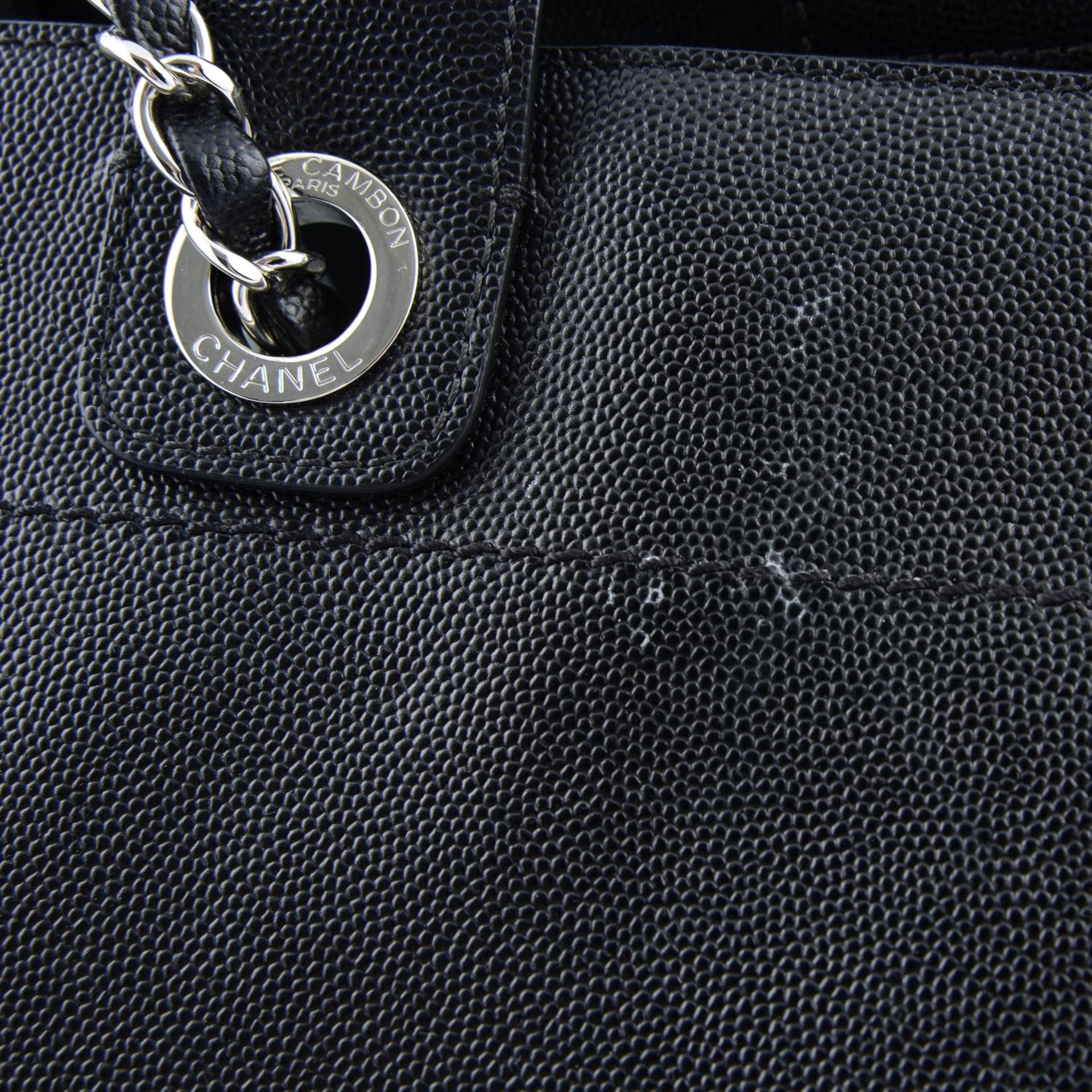 CHANEL - a black Studded Deauville Tote handbag. - Bild 4 aus 6