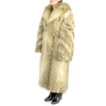 A men's knee-length coyote wolf fur coat.