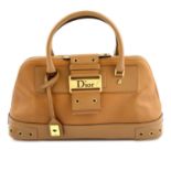 CHRISTIAN DIOR - a tan leather Street Chic bowling handbag.