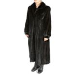 A full-length black mink coat.