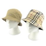 BURBERRY - four reversible bucket hats.