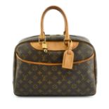 LOUIS VUITTON - a Monogram Deauville Cosmetics handbag.