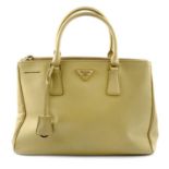 PRADA - a pale yellow Galleria Saffiano leather handbag.