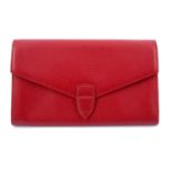 SMYTHSON - a red leather travel wallet.