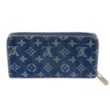 LOUIS VUITTON - a denim Monogram Zippy wallet.