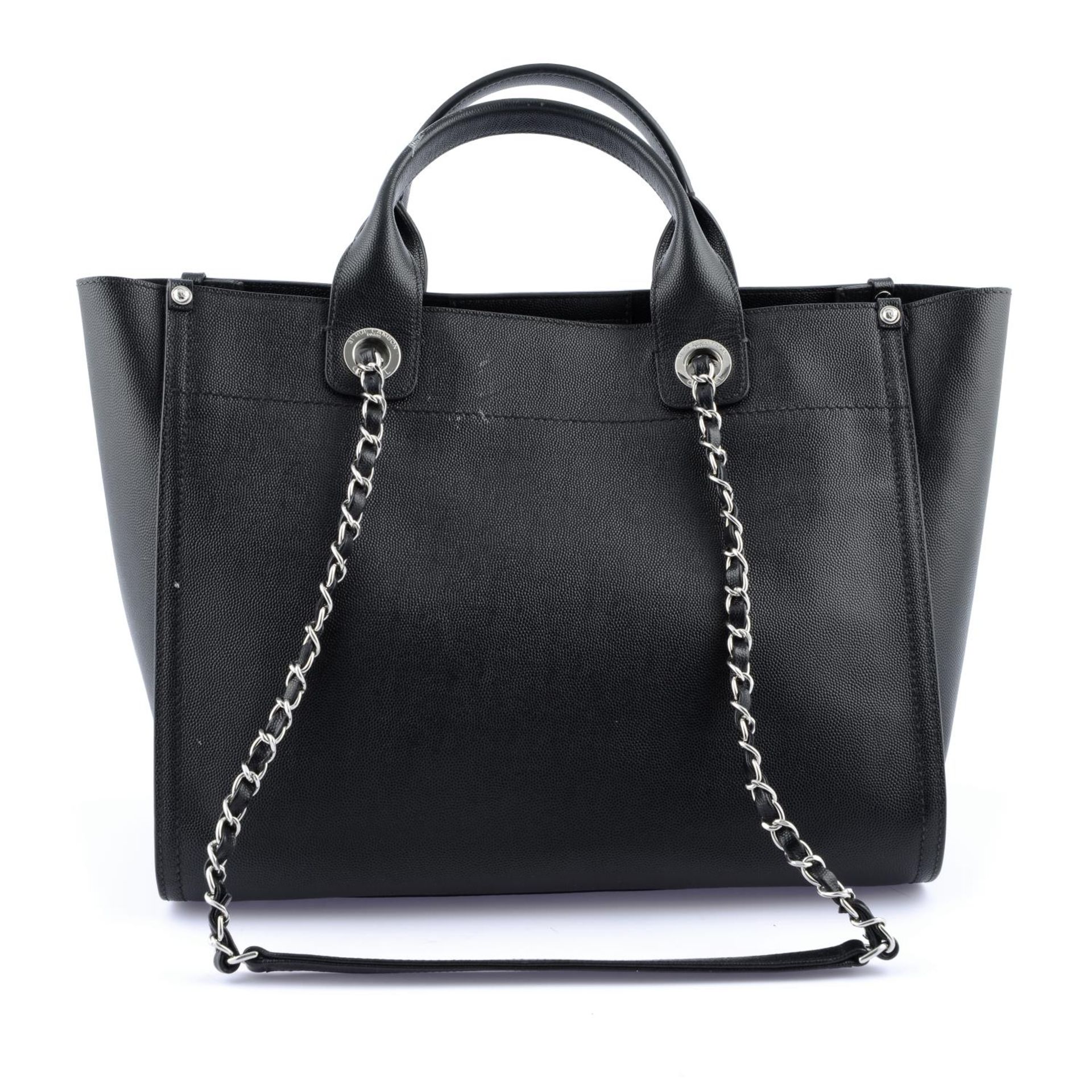 CHANEL - a black Studded Deauville Tote handbag. - Bild 2 aus 6