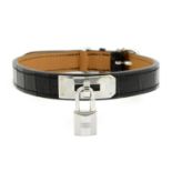 HERMÈS - a Porosus Crocodile Kelly Lock pet collar.