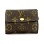 LOUIS VUITTON - a Monogram compact wallet.