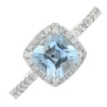 An 18ct gold aquamarine and brilliant-cut diamond cluster ring.Aquamarine weight 1.05cts.Total