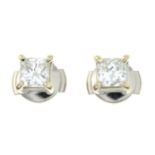 A pair of square-shape diamond single-stone stud earrings.Each laser inscribed 'GIA 7246388486' and