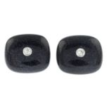 A pair of blue goldstone and brilliant-cut diamond cufflinks.Estimated total diamond weight