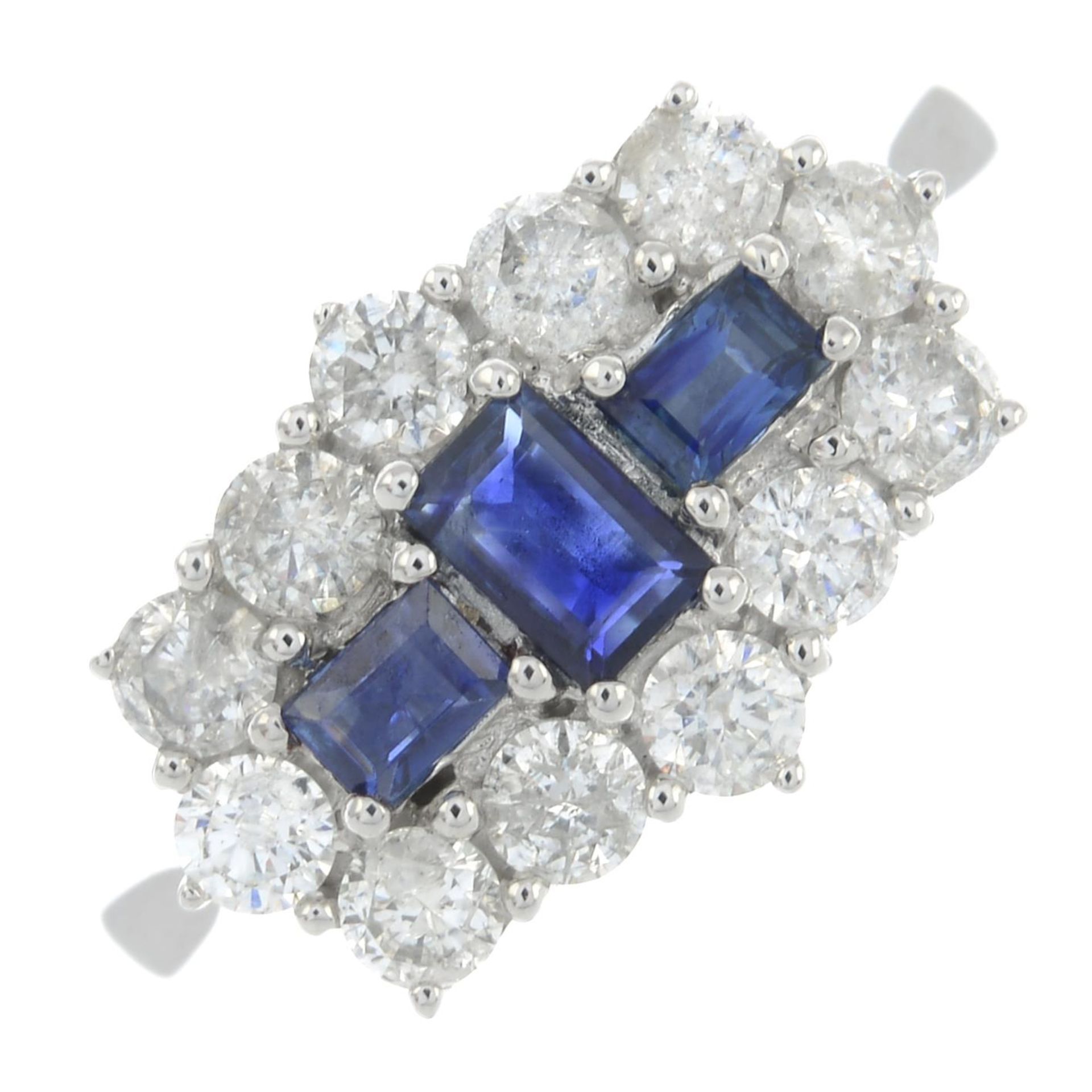 An 18ct gold sapphire and brilliant-cut diamond dress ring.Total sapphire weight 0.56ct.Total