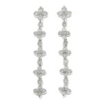 A pair of brilliant-cut diamond quatrefoil drop earrings.Estimated total diamond weight 0.80ct.