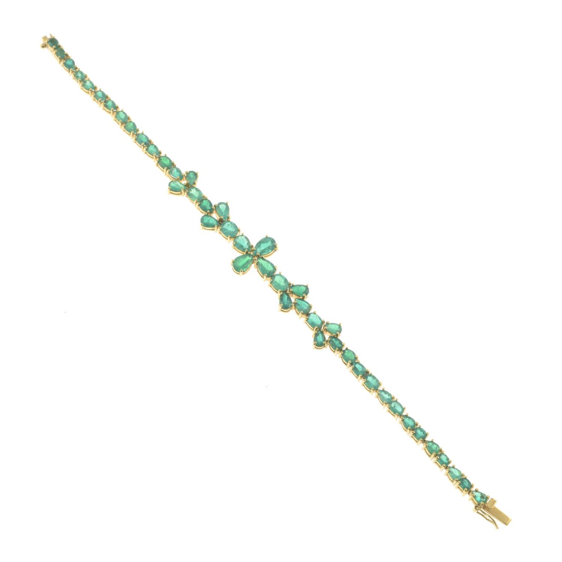 A vari-shape emerald bracelet.Stamped 18k.Length 18.5cms. - Image 2 of 3