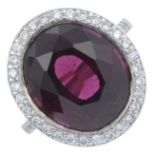 A garnet and brilliant-cut diamond cluster ring.Garnet weight 11.83cts.Estimated total diamond