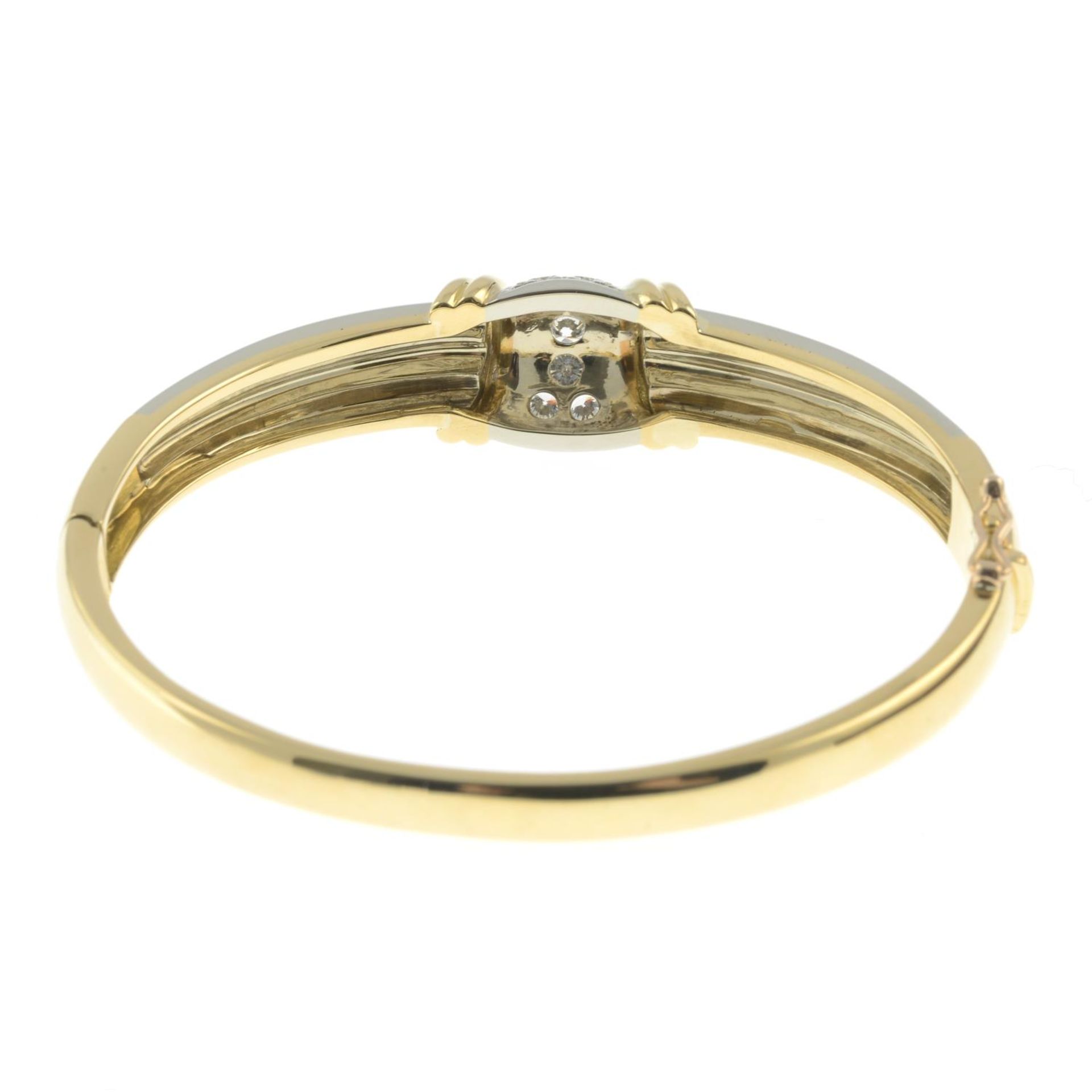 A brilliant-cut diamond bi-colour hinged bangle.Total diamond weight 0.87ct, - Image 2 of 2