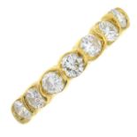 An 18ct gold brilliant-cut diamond seven-stone ring.Estimated total diamond weight 0.75ct,