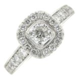 A platinum cushion and brilliant-cut diamond dress ring,