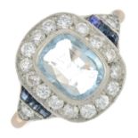 An aquamarine, sapphire and brilliant-cut diamond dress ring.