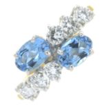 An 18ct gold aquamarine and brilliant-cut diamond dress ring.Estimated total diamond weight 0.60ct,